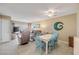 The open floor plan features a dining space adjacent to a living room with a sliding door at 525 N Atlantic Ave # 39, New Smyrna Beach, FL 32169