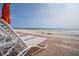 Inviting beach with lounge chairs and umbrellas, perfect for enjoying the ocean breeze at 5501 S Atlantic Ave # 4090, New Smyrna Beach, FL 32169