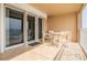 Inviting outdoor patio featuring tile flooring and stylish outdoor dining furniture, perfect for enjoying coastal views at 5501 S Atlantic Ave # 4090, New Smyrna Beach, FL 32169