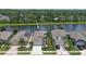 Beautiful waterfront home featuring a well-manicured lawn, long driveway and a two car garage at 551 Armoyan Way, New Smyrna Beach, FL 32168