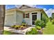 Charming home with a well-maintained front yard, beautiful plants and impeccable curb appeal at 551 Armoyan Way, New Smyrna Beach, FL 32168