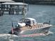 Classic motor yacht underway with American flag, showcasing elegant design and watercraft at 585 Corbin Park Rd, New Smyrna Beach, FL 32168