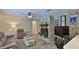 Comfortable living room featuring a stone fireplace and cozy furnishings at 585 Corbin Park Rd, New Smyrna Beach, FL 32168