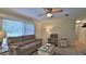 Cozy living room features neutral colors and lots of natural light at 585 Corbin Park Rd, New Smyrna Beach, FL 32168