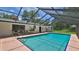 A private in-ground screened pool awaits in the backyard, perfect for relaxing and summer fun at 585 Corbin Park Rd, New Smyrna Beach, FL 32168