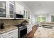 Bright kitchen features stainless steel appliances, granite counters, and a breakfast nook at 5935 Shady Creek Ln, Port Orange, FL 32128