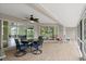 The lanai features a dining table, seating, and tile floors at 5935 Shady Creek Ln, Port Orange, FL 32128