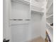 Bright walk-in closet with custom shelving and ample storage space at 620 Middlebury Loop, New Smyrna Beach, FL 32168