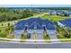 Community of new homes with lush landscaping, spacious driveways, and manicured lawns at 6307 Hanfield Dr, Port Orange, FL 32128