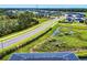 Scenic aerial view of a Primary-planned community showcasing lush landscaping and serene water features in a peaceful setting at 6307 Hanfield Dr, Port Orange, FL 32128