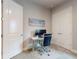 Bedroom with Murphy bed, desk, neutral color palette, and great natural light, a perfect space for relaxation or productivity at 6307 Hanfield Dr, Port Orange, FL 32128