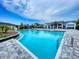 Resort-style pool offers residents a refreshing escape, complete with ample seating and recreational facilities at 6307 Hanfield Dr, Port Orange, FL 32128
