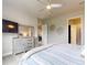 This is the main bedroom, which includes a TV, a ceiling fan, and decor on the wall at 6307 Hanfield Dr, Port Orange, FL 32128