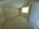 Bedroom with tile floor, skylight, and closet at 6340 Engram Rd, New Smyrna Beach, FL 32169