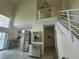 Entryway with tiled floors and modern staircase at 6340 Engram Rd, New Smyrna Beach, FL 32169