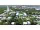Aerial view of a charming neighborhood near the water and beaches. The home is outlined in yellow at 653 Goodwin Ave, New Smyrna Beach, FL 32169