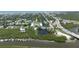Aerial view of home with marina access, nearby businesses, and the Gulf at 653 Goodwin Ave, New Smyrna Beach, FL 32169