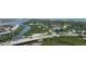 Scenic aerial view showing the neighborhood, surrounding waterways and bridges, highlighting its desirable location at 653 Goodwin Ave, New Smyrna Beach, FL 32169