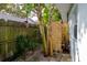 Outdoor shower made of wood on a stone and gravel landscape at 653 Goodwin Ave, New Smyrna Beach, FL 32169