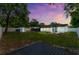 Large backyard with a new deck, privacy fence, and ample space for outdoor activities and relaxation at 680 Buford Ave, Orange City, FL 32763
