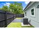 Backyard featuring a dark stained wood deck and fenced in area at 680 Buford Ave, Orange City, FL 32763