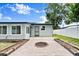 Backyard featuring a fire pit and patio area at 680 Buford Ave, Orange City, FL 32763