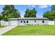 Charming single story home with an attached garage, well-maintained lawn, and lovely curb appeal at 680 Buford Ave, Orange City, FL 32763