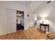 Cozy bedroom with closet, wood floors, and natural light, providing a comfortable and inviting space at 686 Middlebury Loop, New Smyrna Beach, FL 32168