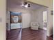 Open floor plan showcasing the living room, leading to the sunroom and breakfast nook at 686 Middlebury Loop, New Smyrna Beach, FL 32168