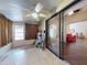 Sunroom offering plenty of space, large sliding glass doors, and a ceiling fan at 686 Middlebury Loop, New Smyrna Beach, FL 32168