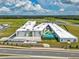 Aerial view of Ina A. Colen Academy featuring modern architecture, play areas, and green spaces for learning and recreation at 7223 Sw 61St Pl, Ocala, FL 34474
