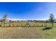 Spacious bark park with lush green grass, offering a great space for furry friends to play at 7223 Sw 61St Pl, Ocala, FL 34474
