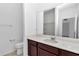 Bathroom with a modern vanity, ample counter space, and neutral color scheme, offering functionality at 7223 Sw 61St Pl, Ocala, FL 34474