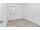 Bedroom with window, creating a bright and inviting space at 7223 Sw 61St Pl, Ocala, FL 34474