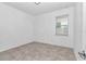 Bedroom with window, creating a bright and inviting space at 7223 Sw 61St Pl, Ocala, FL 34474