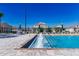 Beautiful community pool features a cascading water fountain and comfortable seating, ideal for relaxation and community gatherings at 7223 Sw 61St Pl, Ocala, FL 34474
