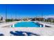 Sparkling community pool with water fountains and lounge seating area offers a relaxing retreat at 7223 Sw 61St Pl, Ocala, FL 34474