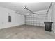 Spacious garage with an automatic door, offering convenient parking and storage solutions at 7223 Sw 61St Pl, Ocala, FL 34474