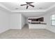 Spacious living area with tile floors, and view of modern kitchen at 7223 Sw 61St Pl, Ocala, FL 34474