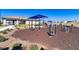Community playground featuring workout equipment, picnic area, and mulched ground at 7223 Sw 61St Pl, Ocala, FL 34474