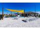 Gathering-friendly splash pad area with colorful water features and shaded seating for sunny days at 7223 Sw 61St Pl, Ocala, FL 34474