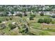 Community aerial view showcasing golf course access near a desirable neighborhood at 798 Fairway Dr, New Smyrna Beach, FL 32168