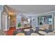 Charming dining area that provides seamless flow into the living room at 798 Fairway Dr, New Smyrna Beach, FL 32168