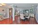 Elegant dining room with hardwood floors and stylish furnishings at 798 Fairway Dr, New Smyrna Beach, FL 32168
