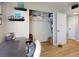 Office space features a closet, shelves, and a light wood floor at 903 Conrad Dr, New Smyrna Beach, FL 32168