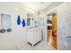 Elegant bathroom with a marble countertop vanity, mosaic tile floors, and a modern shower at 934 N Halifax Ave, Daytona Beach, FL 32118