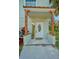 Inviting front porch with decorative accents, adding charm and curb appeal at 934 N Halifax Ave, Daytona Beach, FL 32118