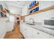 Bright kitchen with white cabinets, modern countertops, and stainless steel appliances at 934 N Halifax Ave, Daytona Beach, FL 32118