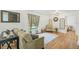 Bright living room with hardwood floors, neutral decor, and a comfortable seating area at 934 N Halifax Ave, Daytona Beach, FL 32118