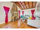 Inviting living room with stone fireplace, hardwood floors, and a cozy seating arrangement at 934 N Halifax Ave, Daytona Beach, FL 32118